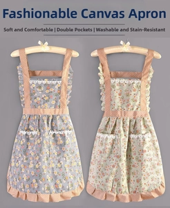 Close-up of floral canvas apron featuring polka dot lace ruffles and double pockets