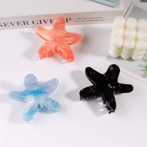 Pinze per capelli a stella marina in rosa, blu e nero con trama marmorea di 8,6cm