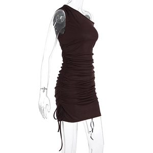 Detail of the side drawstring and ruched texture on this dark brown one-shoulder mini dress