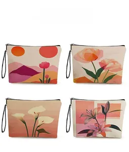 Detailed grid of four floral cosmetic bags with zippers and sturdy wristlet handles