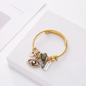 Bracelet jonc doré avec œil maléfique, pierre naturelle et breloque faite à la main