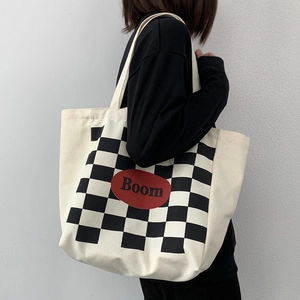Large capacity canvas tote bag with black and white checkerboard pattern and Boom logo