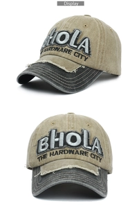 Detail of vintage washed baseball cap with embroidered patch and distressed brim edges