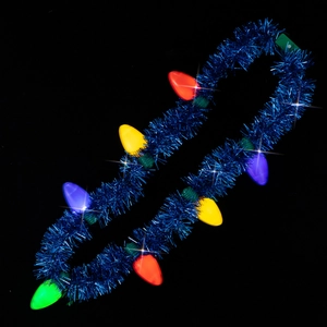 Close-up of LED Christmas necklace with colorful bulbs and dark blue tinsel garland