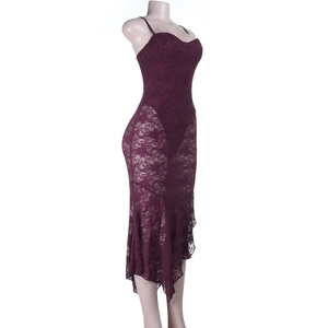 Detailed view of the intricate floral lace texture and mermaid hem of the dark plum dress