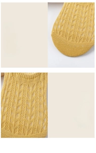 Macro detail of smooth toe seams and breathable mesh texture on yellow summer socks
