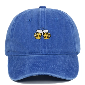Close-up of beer glasses embroidery on navy blue washed cotton baseball cap