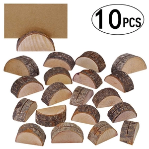 Close-up of 10-piece rustic wood card holders with natural bark for table displays
