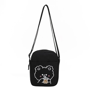 Cute black canvas crossbody phone bag featuring a cartoon bear embroidery and strap