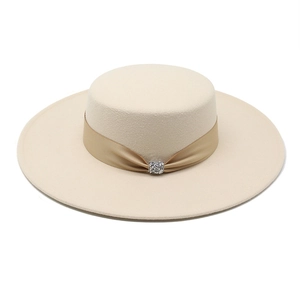 Elegant beige flat top wool felt boater hat with a silk ribbon and rhinestone buckle