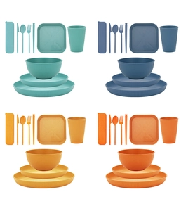 Eco-friendly wheat straw dinnerware sets in blue, yellow, and orange with matte texture