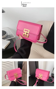Detailed close-up of fuchsia small square bag with golden buckle and sleek faux leather