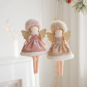 Detail of plush Christmas angel ornaments with velvet fabric and glitter wings set