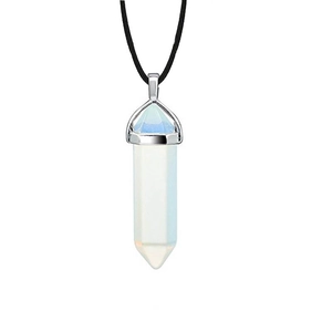 Detail view of hexagonal white opal crystal pendant with silver metal cap on black cord