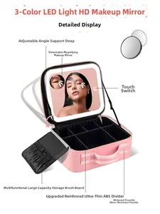 Detail view of pink makeup case with built-in LED mirror and adjustable dividers