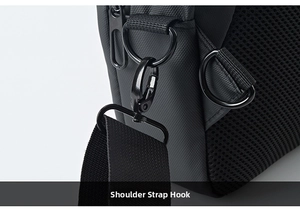 Close-up of black metallic swivel hook and D-ring on high-density nylon shoulder bag