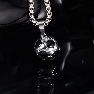 Polished silver football pendant with black enamel details on a shiny square box chain necklace