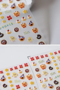 Detailed macro view of 5D embossed Christmas cookie party nail art stickers with relief texture