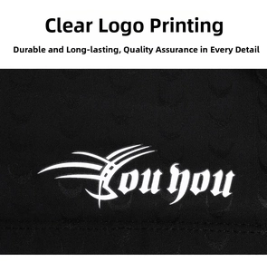 Macro shot of white you you logo printed on black fabric showing material texture