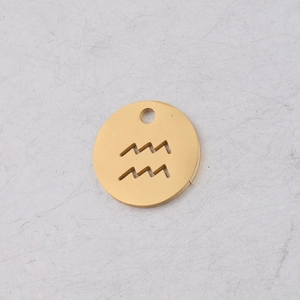 Detailed macro view of a 12mm golden Aquarius zodiac pendant with hollow wave pattern