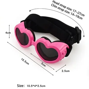 Pink heart-shaped pet sunglasses with adjustable black straps and foldable frame