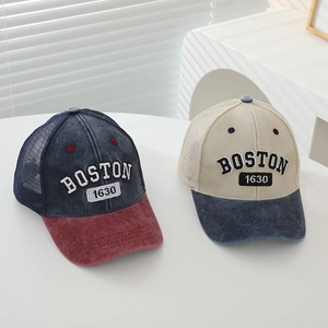 Detail of Boston 1630 3D embroidery and breathable mesh on kids trucker caps