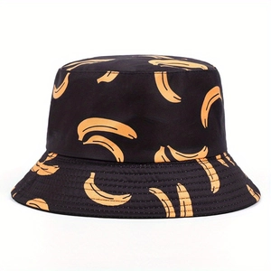 Close-up of black sun bucket hat with yellow banana pattern and high-quality stitching