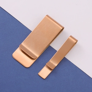 Polished rose gold stainless steel money clip set with brushed finish and minimal design