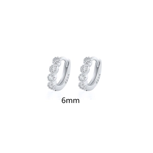 Close-up of 6mm S925 sterling silver hoop earrings featuring four small inlaid diamonds