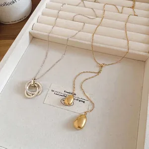 18k gold plated teardrop Y-necklace and interlocking circles silver pendant jewelry set