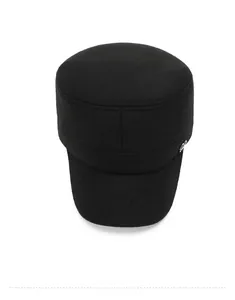 Top view of a black wool cadet cap showing the crown texture and silver metal side button