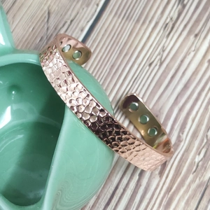 Magnetic copper cuff bracelet with a wavy hammered texture and open design