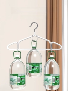 Detail of heavy duty white clothes hanger holding three large water jugs to show durability