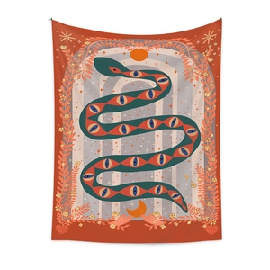 Bohemian tapestry featuring mystical snake and all-seeing eye design in earthy tones