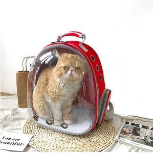 Bright red breathable pet space capsule backpack with transparent cover and ventilation holes