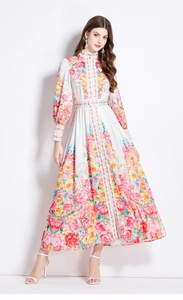 Detailed view of floral long sleeve maxi dress with stand collar and matching waist belt