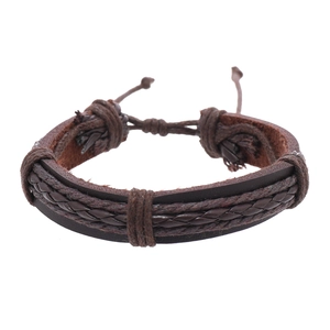 Men's minimalist braided brown leather bracelet with adjustable cord and vintage texture