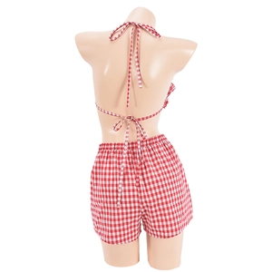 Back view of red and white plaid two-piece set featuring halter top and shorts