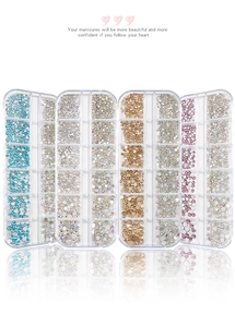 Macro shot of 12-grid nail art crystal set with multi-color flatback rhinestones in boxes