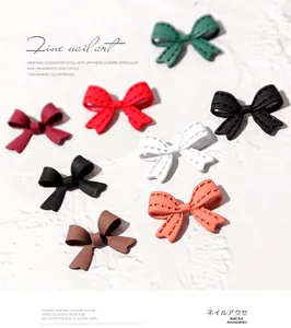 Detailed close-up of 3D matte resin ribbon bows for nail art in various vibrant colors