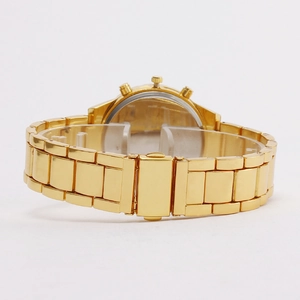 Golden Geneva crystal watch showing the detailed metal strap and folding clasp back