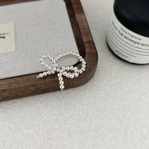 925 Sterling Silver Beaded Bow Ring with minimalist open design and polished finish