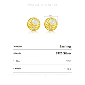 Detail view of S925 silver heart stud earrings with opal and zircon in gold finish