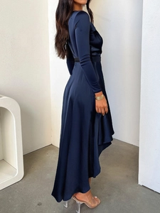 Elegant deep blue silk-textured long sleeve dress with asymmetrical irregular hemline