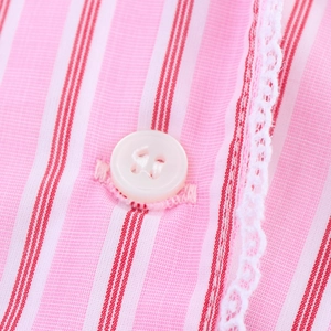 Pink striped shirt with white button detail and delicate lace trim for a sweet feminine look