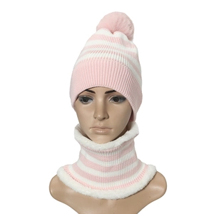 Pink and white striped knit hat and scarf set with pompom for kids on white background
