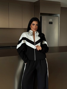 Ensemble de sport bicolore noir et blanc avec sweat à zip et pantalon taille haute