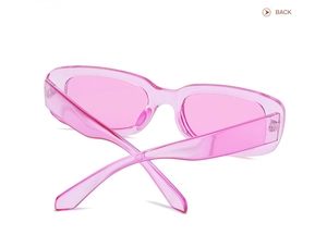 Back view of rectangle sunglasses featuring a pink transparent frame and Y2K retro style