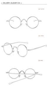 Detailsicht der silbernen runden Metallbrille mit klaren Gläsern und verstellbaren Nasenpads