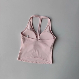 Débardeur de yoga rose extensible avec doubles bretelles croisées et coussinets